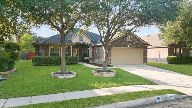 5327 Gemsbuck Chase, San Antonio, TX 78251 - single story home with brick siding, an attached garage, and concrete driveway
