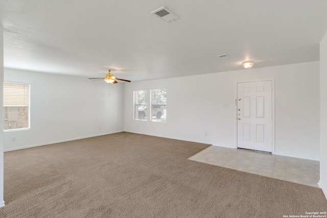 9423 Maraval Crk, San Antonio, TX 78245 - spare room with carpet flooring, ceiling fan, and baseboards