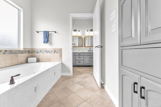 1216 Windy Dawn, Seguin, TX 78155 - full bathroom with double vanity, a whirlpool tub, baseboards, and tile patterned floors