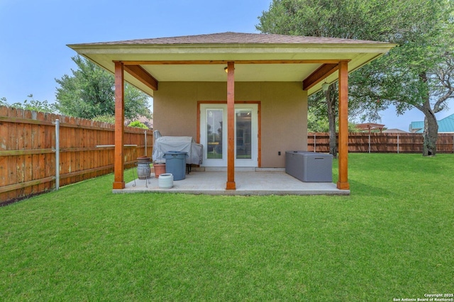 1216 Windy Dawn, Seguin, TX 78155 - rear view of house with a patio area, stucco siding, central AC unit, and roof with shingles