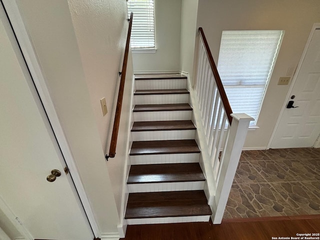 7835 Ruby Mdw, San Antonio, TX 78251 - stairway with wood finished floors and baseboards