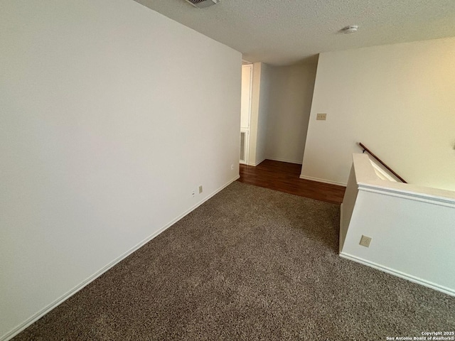 7835 Ruby Mdw, San Antonio, TX 78251 - carpeted spare room with a smoke detector and a textured ceiling