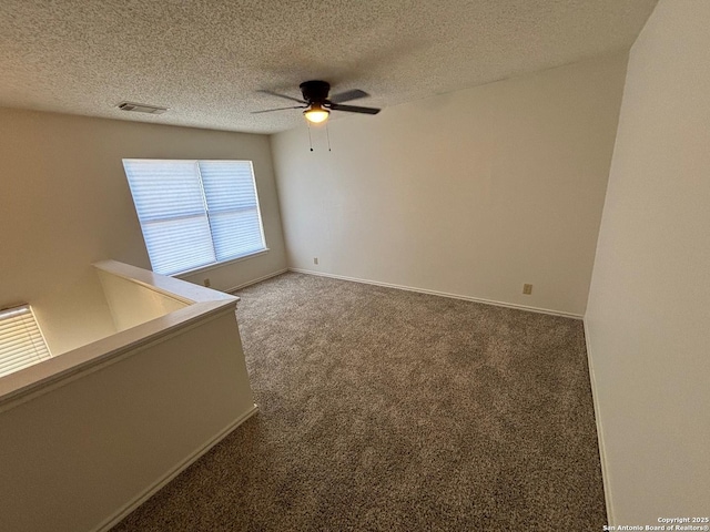 7835 Ruby Mdw, San Antonio, TX 78251 - carpeted empty room featuring ceiling fan, a textured ceiling, and baseboards