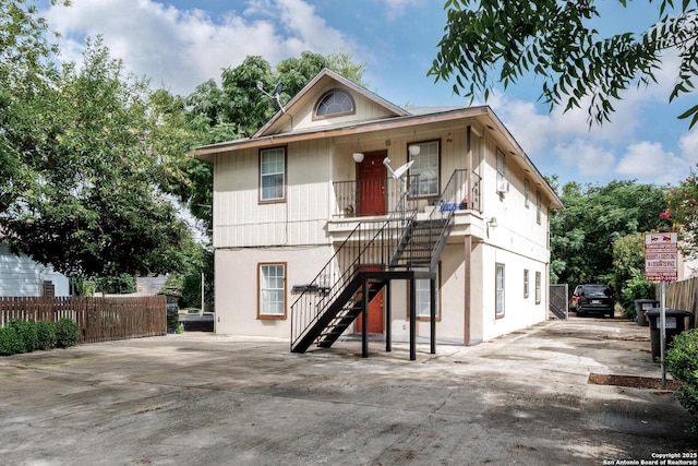 2313 Fresno, San Antonio, TX 78201 - view of front facade featuring driveway, stairway, and a porch