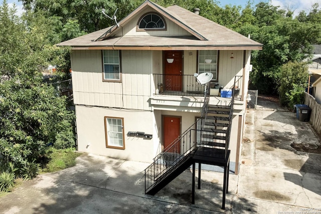 2313 Fresno, San Antonio, TX 78201 - view of front of house with stairs, a porch, and roof with shingles