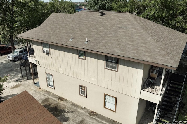 2313 Fresno, San Antonio, TX 78201 - view of side of home with a shingled roof