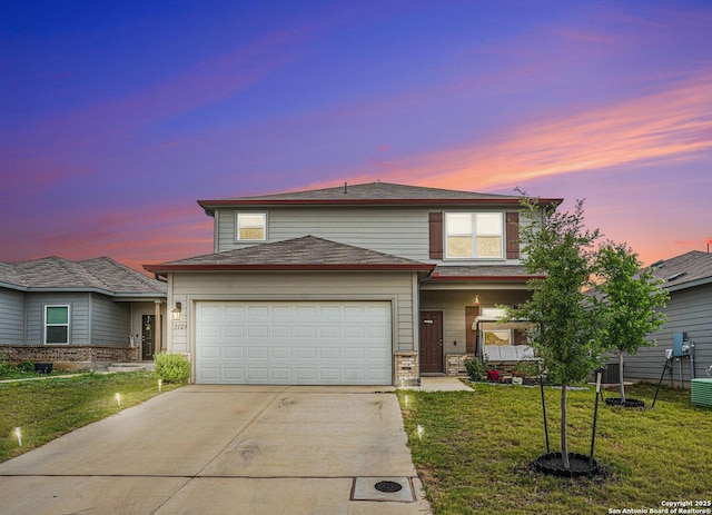 7129 Pisces, Converse, TX 78109 - traditional home featuring driveway, a garage, and a lawn