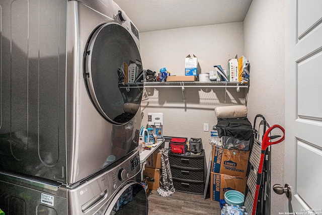7129 Pisces, Converse, TX 78109 - washroom with estacked washer and dryer and wood finished floors