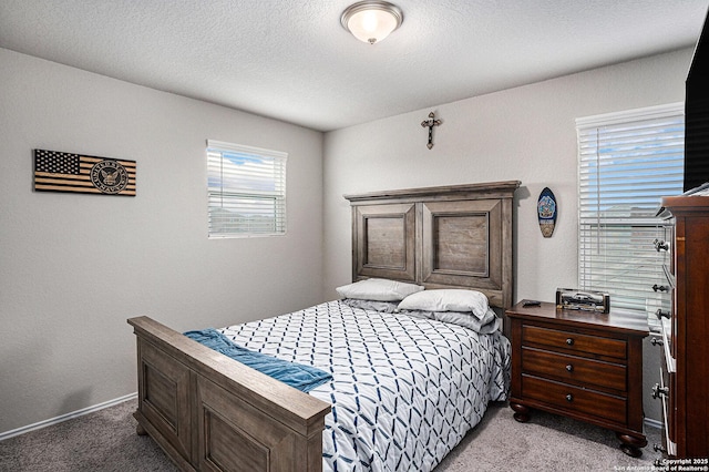 7129 Pisces, Converse, TX 78109 - carpeted bedroom with baseboards and a textured ceiling