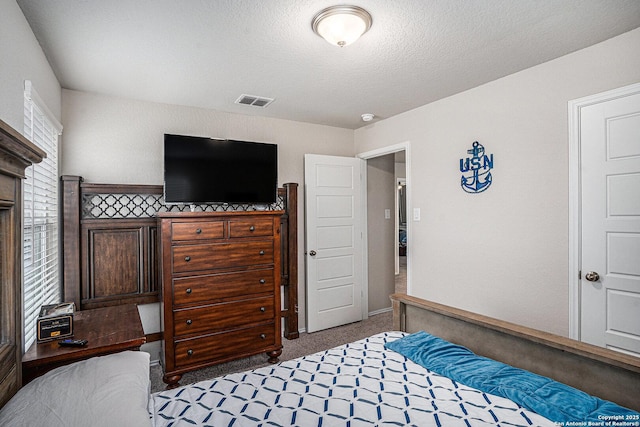 7129 Pisces, Converse, TX 78109 - carpeted bedroom with a textured ceiling