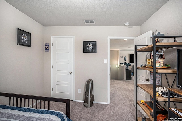7129 Pisces, Converse, TX 78109 - carpeted bedroom with a textured ceiling and baseboards