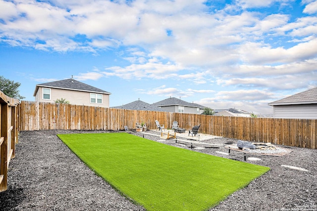 7129 Pisces, Converse, TX 78109 - view of yard featuring a patio and a fire pit