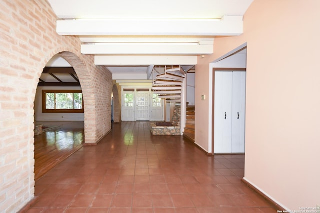 5803 Hollyhock, San Antonio, TX 78240 - hall with arched walkways, beamed ceiling, tile patterned flooring, and baseboards