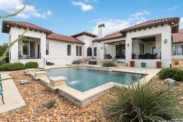 23510 Avila, San Antonio, TX 78255 - rear view of property with a ceiling fan, stucco siding, a tiled roof, a patio, and an outdoor pool