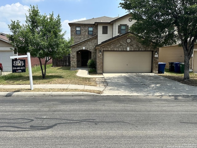 8815 Adhinger, San Antonio, TX 78245 - traditional-style house with brick siding, a garage, and concrete driveway