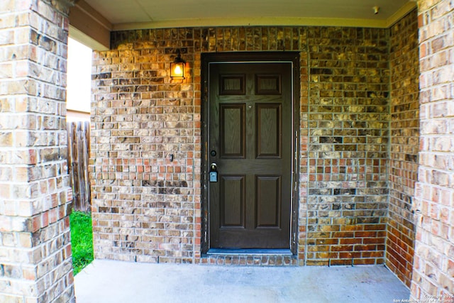 8815 Adhinger, San Antonio, TX 78245 - view of exterior entry featuring brick siding and covered porch