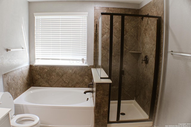 8815 Adhinger, San Antonio, TX 78245 - full bathroom featuring a garden tub, a stall shower, toilet, and vanity
