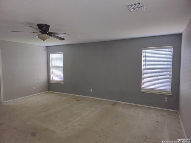 8815 Adhinger, San Antonio, TX 78245 - empty room with ceiling fan, light colored carpet, and baseboards