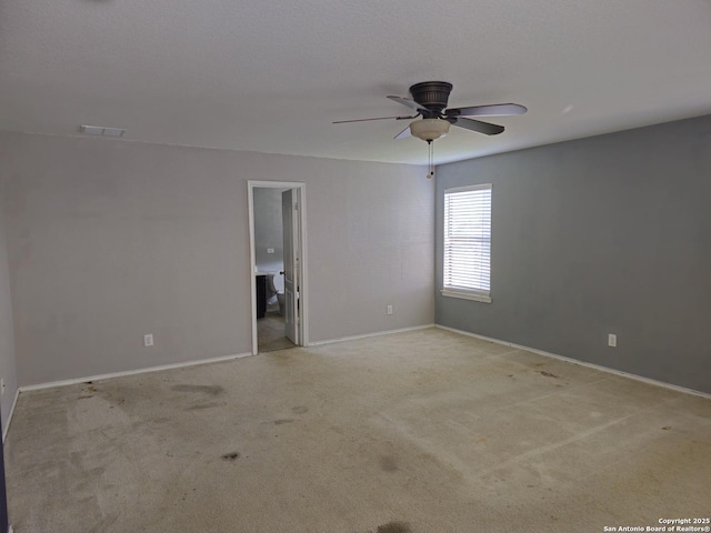 8815 Adhinger, San Antonio, TX 78245 - empty room with a ceiling fan, light carpet, and baseboards