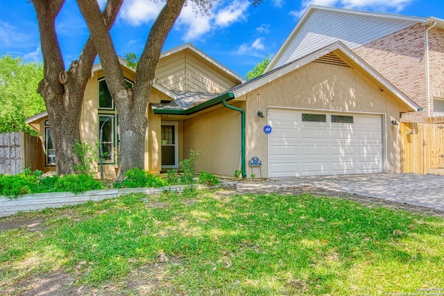 15018 Miss Ellie Dr, San Antonio, TX 78247 - view of front facade with an attached garage and driveway
