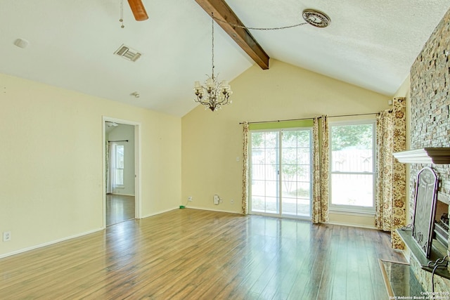 15018 Miss Ellie Dr, San Antonio, TX 78247 - unfurnished living room with hardwood / wood-style flooring, a fireplace, a chandelier, baseboards, and a ceiling fan