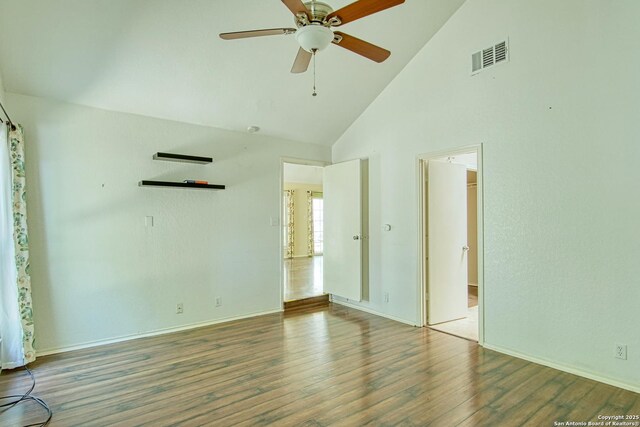 15018 Miss Ellie Dr, San Antonio, TX 78247 - spare room with wood finished floors, high vaulted ceiling, a ceiling fan, and baseboards