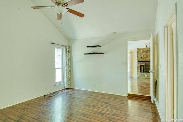 15018 Miss Ellie Dr, San Antonio, TX 78247 - unfurnished room featuring wood finished floors, ceiling fan, a fireplace, baseboards, and high vaulted ceiling