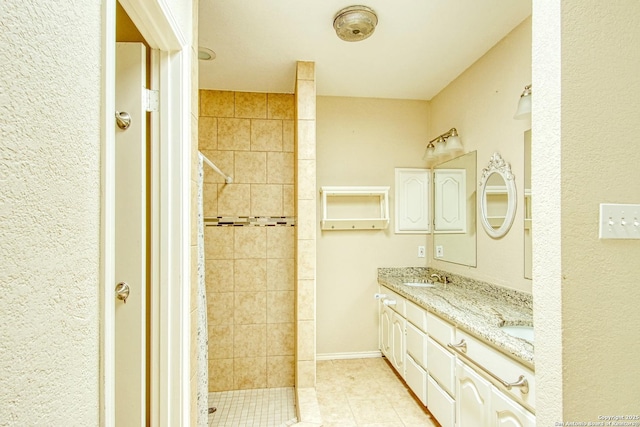 15018 Miss Ellie Dr, San Antonio, TX 78247 - full bath featuring double vanity, a tile shower, and tile patterned floors