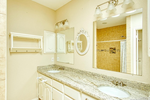 15018 Miss Ellie Dr, San Antonio, TX 78247 - bathroom featuring double vanity and a tile shower