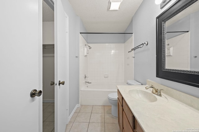 9387 Village Lance, San Antonio, TX 78250 - bathroom featuring tile patterned floors, vanity, toilet, a textured ceiling, and bathtub / shower combination