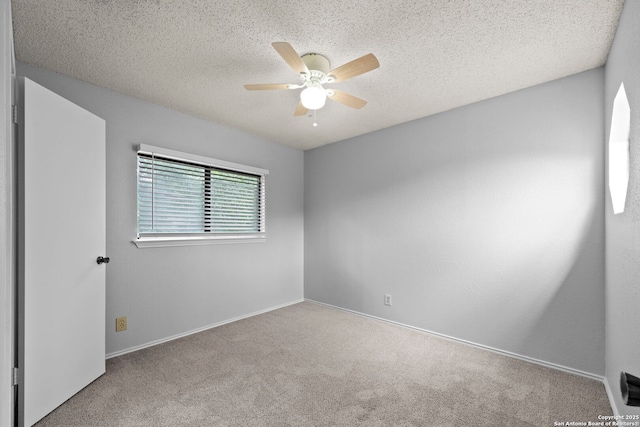 9387 Village Lance, San Antonio, TX 78250 - carpeted empty room with ceiling fan and a textured ceiling