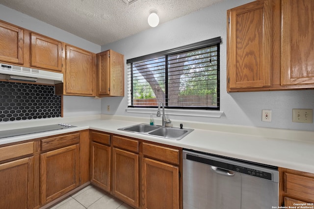 9387 Village Lance, San Antonio, TX 78250 - kitchen with dishwasher, a sink, under cabinet range hood, light countertops, and a textured ceiling