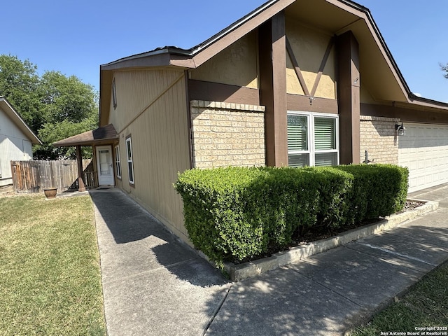 5134 Mayspring, San Antonio, TX 78217 - view of side of home with a garage
