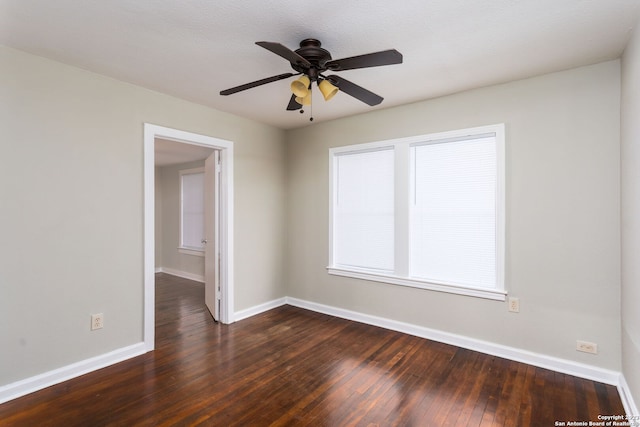 305 Kendalia, San Antonio, TX 78214 - unfurnished room featuring dark wood-style floors, baseboards, and ceiling fan