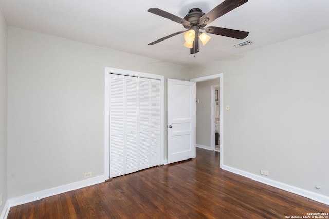 305 Kendalia, San Antonio, TX 78214 - unfurnished bedroom featuring baseboards, a closet, wood finished floors, and ceiling fan