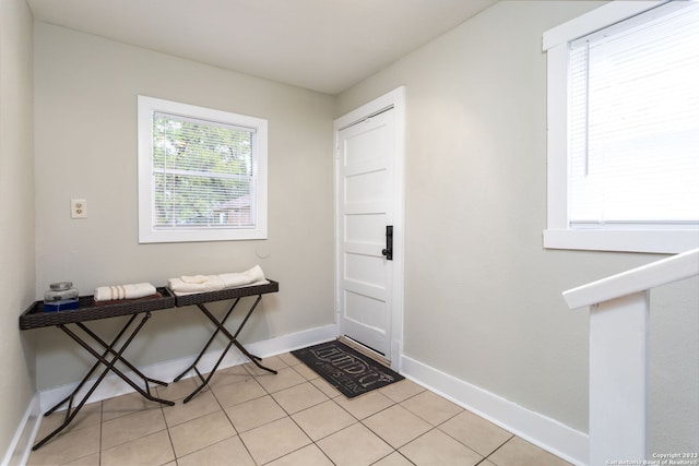 305 Kendalia, San Antonio, TX 78214 - entryway with baseboards and light tile patterned flooring