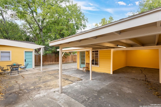 305 Kendalia, San Antonio, TX 78214 - view of patio featuring a carport