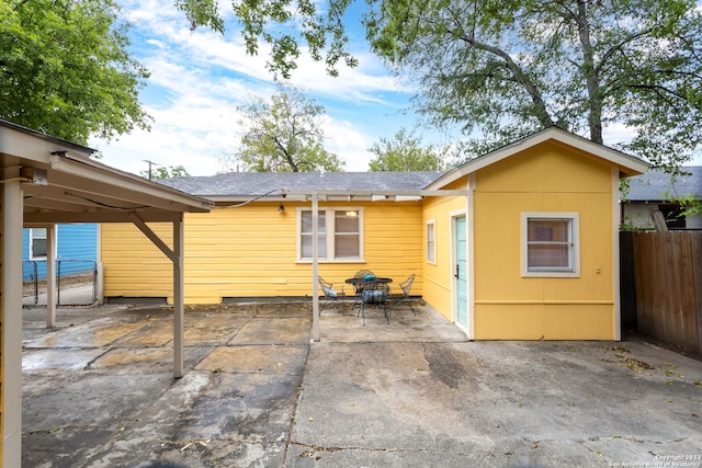 305 Kendalia, San Antonio, TX 78214 - back of property featuring a patio and roof with shingles