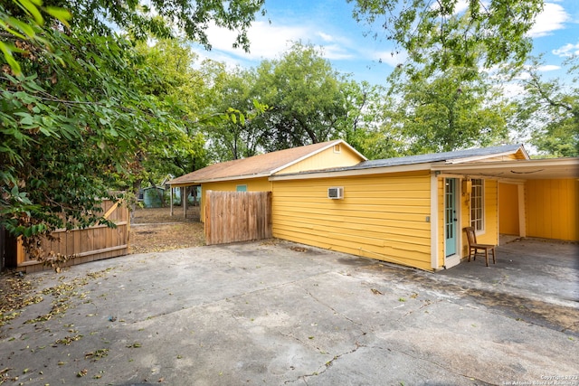 305 Kendalia, San Antonio, TX 78214 - view of side of home featuring concrete driveway