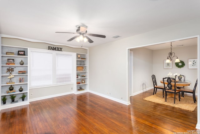 305 Kendalia, San Antonio, TX 78214 - living room featuring hardwood / wood-style floors, a ceiling fan, baseboards, a chandelier, and built in features