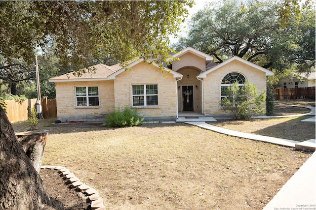 22919 Hightop, Elmendorf, TX 78112 - view of front facade with stone siding