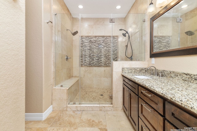 22919 Hightop, Elmendorf, TX 78112 - full bath with a shower stall, vanity, and recessed lighting