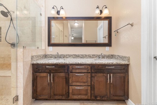 22919 Hightop, Elmendorf, TX 78112 - bathroom featuring double vanity and a stall shower