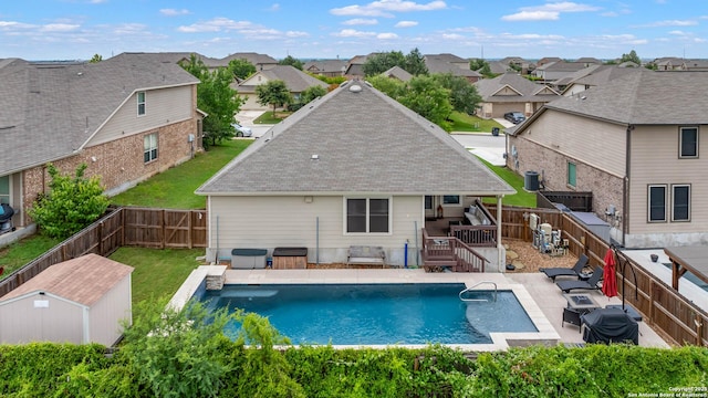 1926 Kalli Jo Ln, New Braunfels, TX 78130 - rear view of property featuring a residential view, a deck, roof with shingles, a patio, and an outdoor living space