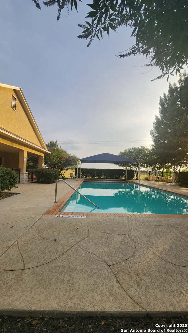 1926 Kalli Jo Ln, New Braunfels, TX 78130 - community pool featuring a patio