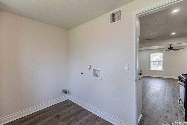 1309 Quintana Rd, San Antonio, TX 78211 - laundry area featuring hookup for an electric dryer, hookup for a washing machine, gas dryer hookup, dark wood-type flooring, and baseboards