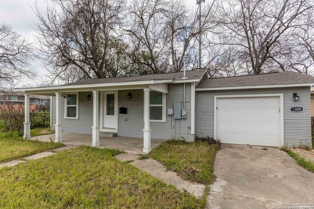 1309 Quintana Rd, San Antonio, TX 78211 - view of front facade with an attached garage, a front yard, covered porch, driveway, and a shingled roof