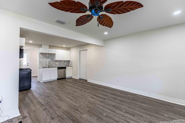 1309 Quintana Rd, San Antonio, TX 78211 - unfurnished living room with dark wood finished floors, baseboards, a ceiling fan, recessed lighting, and a sink