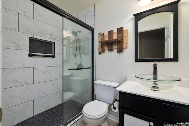 2392 Medina, New Braunfels, TX 78130 - full bathroom with vanity, tiled shower, and toilet
