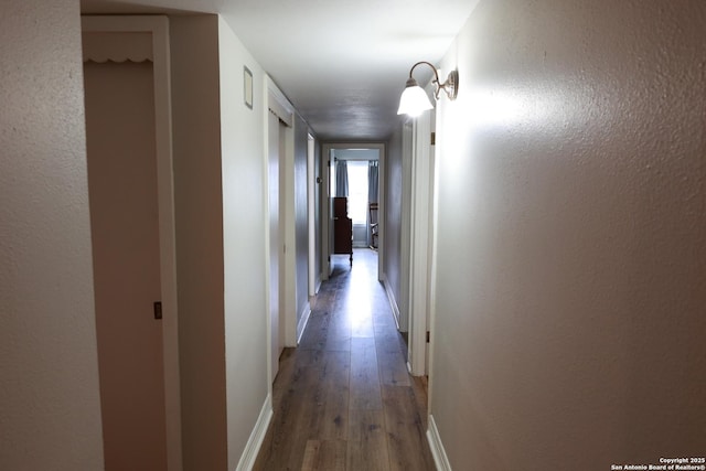 215 Five Oaks, San Antonio, TX 78209 - hallway featuring light wood finished floors and baseboards
